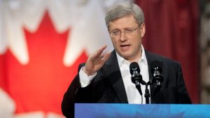 Conservative Leader Stephen Harper answers a question during a media availability following a campaign visit to a factory in Brampton, Wednesday, March 30, 2011. (Adrian Wyld / THE CANADIAN PRESS)