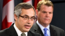 Minister of Foreign Affairs John Baird and President of the Treasury Board and Minister for the Federal Economic Development Initiative for Northern Ontario Tony Clement comment on the Auditor Generals report in Ottawa, Thursday, June 9, 2011. (Adrian Wyld / THE CANADIAN PRESS)