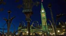Parliament Hill is illuminated at dusk on Nov. 17, 2011. - Parliament Hill is illuminated at dusk on Nov. 17, 2011. | Sean Kilpatrick/The Canadian Press