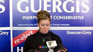 Helena Guergis tries to hold back her emotions while speaking to reporters at her campaign office in Collingwood, Ont., April 15. Guergis blamed Stephen Harper's office for a smear campaign that got her ousted from cabinet and caucus. 